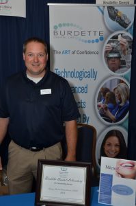 Matt Parker, CDT accepts award on behalf of Burdette Dental Lab in AL