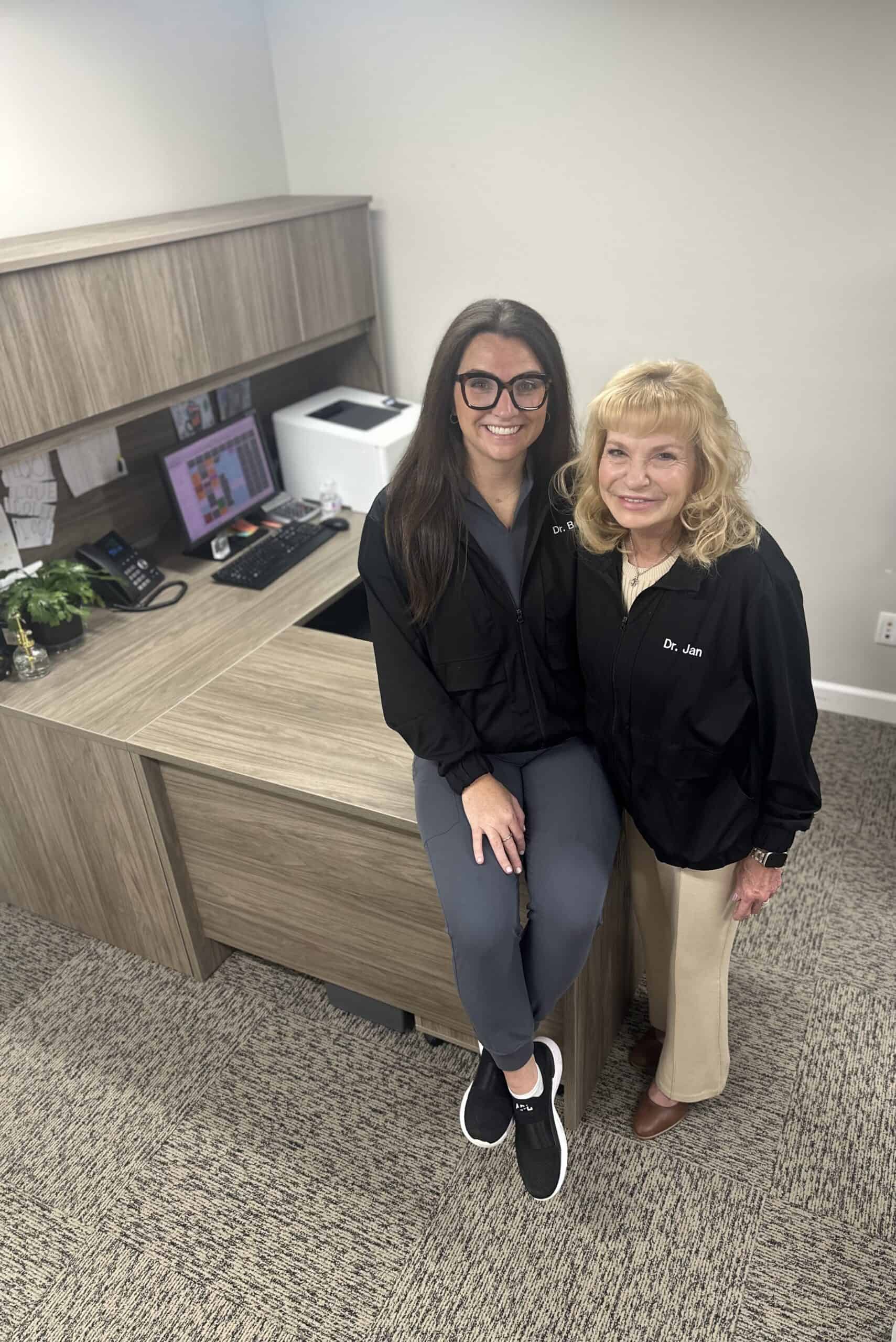 Mother and Daughter Dentist Duo Smiling.