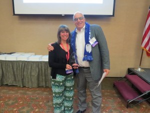 Dr. Bruce Burton, DLN ● Oregon leadership council member and Oregon Dental Association board member presented Dr. Deborah Struckmeier with outstanding volunteer award. 
